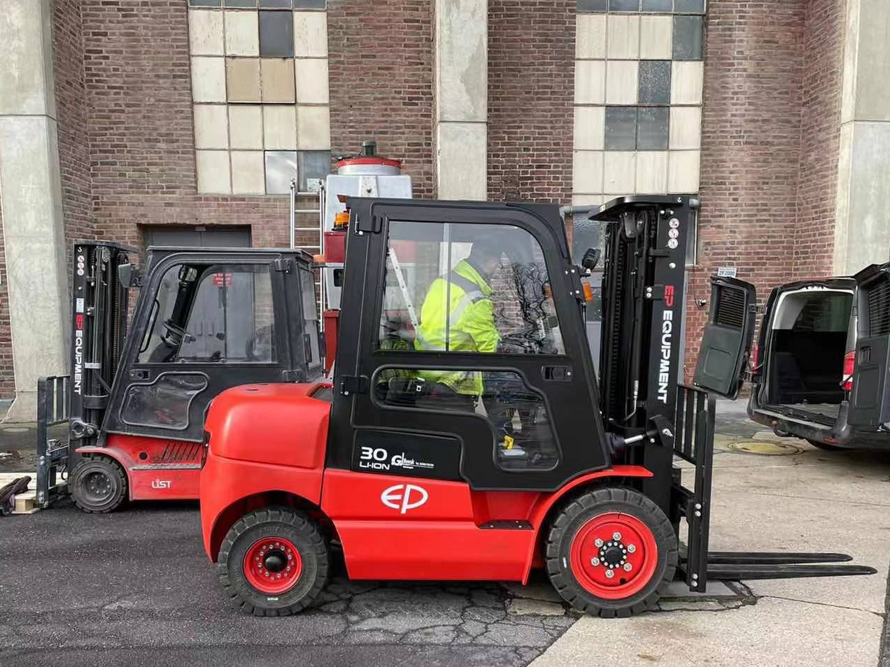 EFL electric forklift truck operating outdoor.