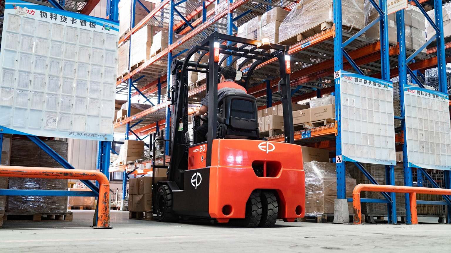 TVL forklift truck being used in a warehouse.