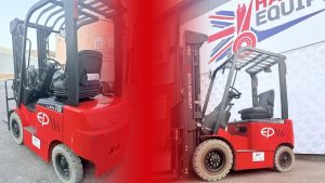 two red forklifts